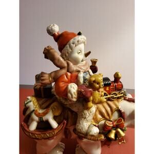 Christmas Ceramic Figurine - Child Riding a Polar Bear